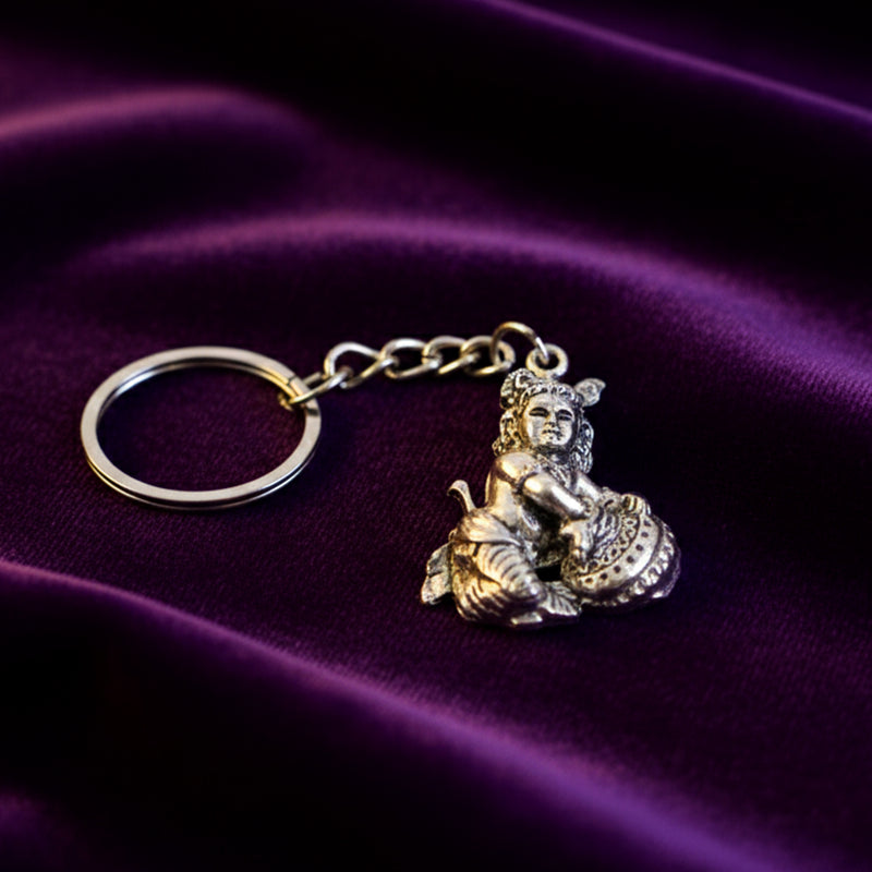 Premium Silver-finish Metal Bal Krishna Eating Makhan Keychain (1 Pc)